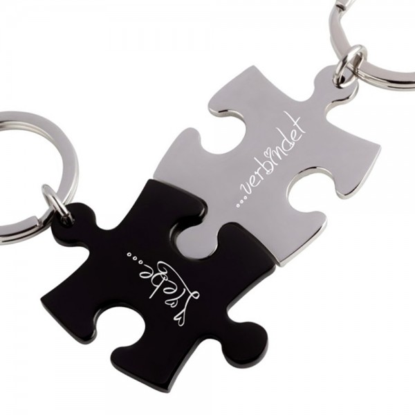 Trendgravur Partner-Schlüsselanhänger mit Gravur Puzzle silber schwarz
